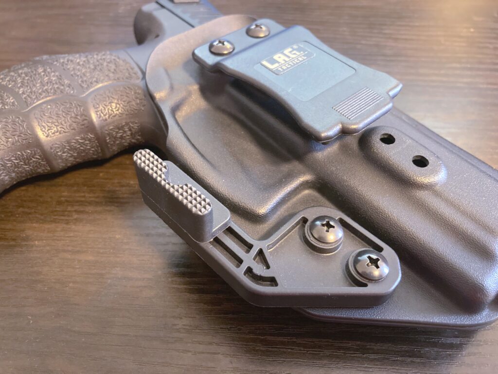 H&K VP9 in a L.A.G. Tactical right handed appendix carry holster with claw.